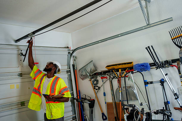 Professional Garage Door Panel Replacement technician working in Loves Park, IL
